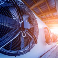 Metal industrial air conditioning vent. HVAC. Ventilation fan background.